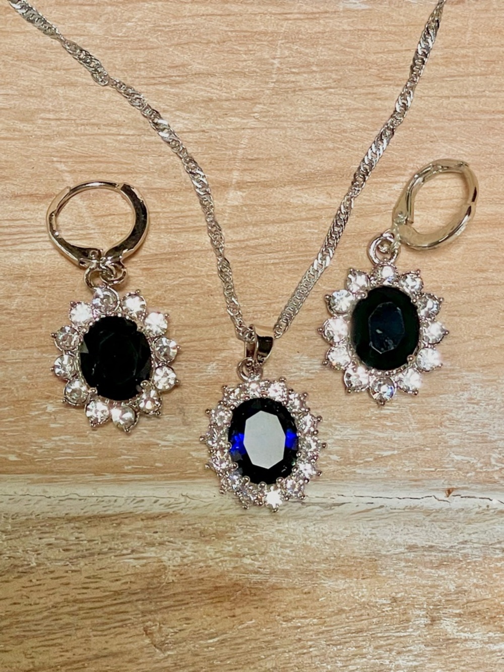 925 Sterling Silver Necklace and Earring Set with Dark Blue Oval Crystals